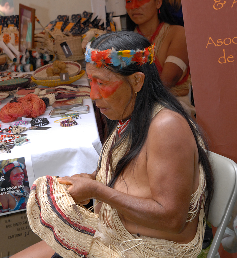 July 4th Celebration at U.S. Embassy in Ecuador Women from the Association of Waorani Women, beneficiaries of USAID programs, demonstrate how they produce handicrafts to benefit and self-sustain women of the association at the U.S. Embassy Quito in Ecaudor’s U.S. Independence Day celebration on July 2, 2010. State Department photo/ Public Domain