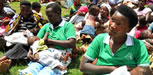 A group of women breastfeed their children during a nursing class. Photo credit: Kate Consavage/USAID