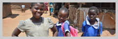 Three young girls smile for the camera