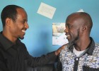 Megersa Abate, left, congratulates Abdela Muhammed Ahimed after successfully getting his conviction overturned.