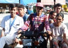 A nurse from the Maragusan Rural Health Unit, left, gets ready to visit patients in surrounding villages on a motorcycle taxi.