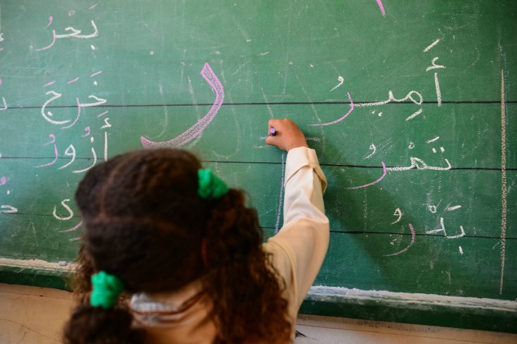 A girl puts her knowledge to the test during an in-class exercise