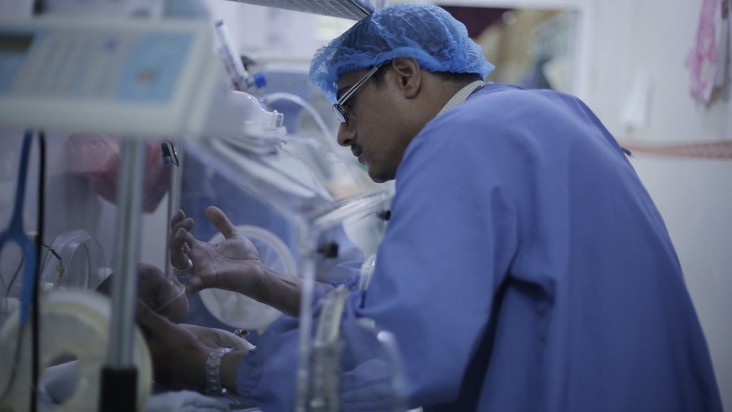 A doctor in the neonatal intensive care unit at a hospital in Amran, Yemen. 