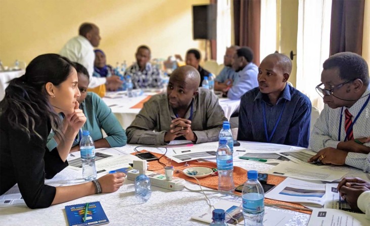 workshop attendees participating in a table discussion