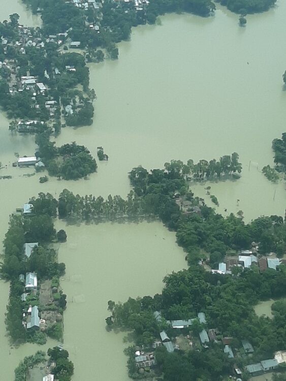 Madhya Khatiamari villagers receive emergency relief from a U.S. government-funded program.