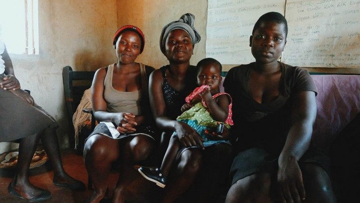 Photograph of a group of women with children. Photo credit: PATH