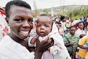 Photo of a mother holding her child