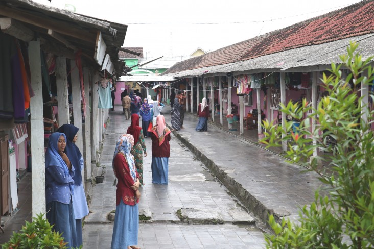 Students in Dorm D. Before, one all-purpose bathroom served the needs of over 330 girls. Now, the facilities are greatly improved.