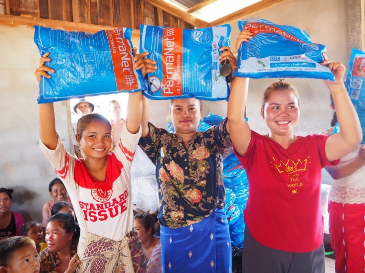  Villagers receive their bednets in rural Laos.