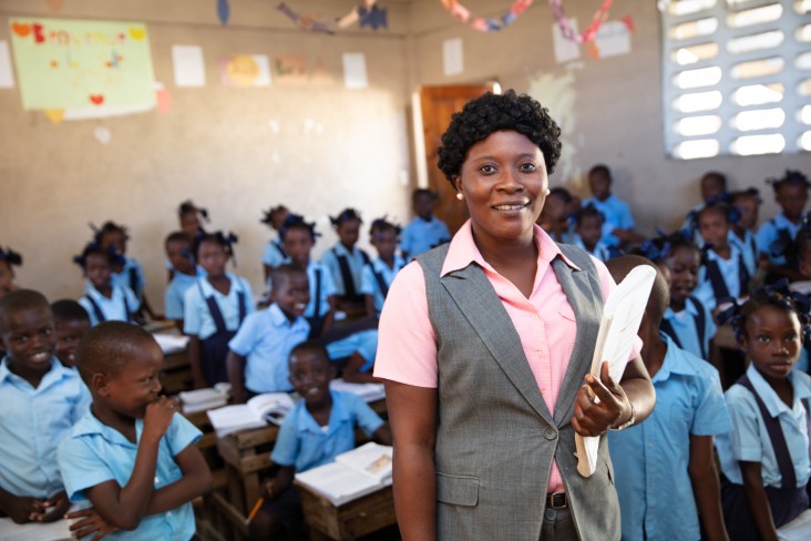 Gislaine Davilmar, 2nd grade teacher in Cap Haitien, is using the USAID and Governement of Hiait - created early grade literacy curriculum