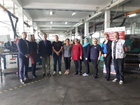 New employees of Saraj-Komerc in Gornji Vakuf, Bosnia and Herzegovina, and USAID WHAM project team following workforce development training.