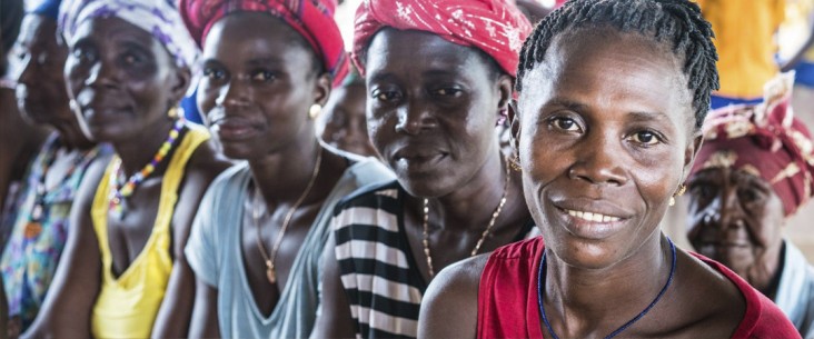 Close up photo of a group of smiling women