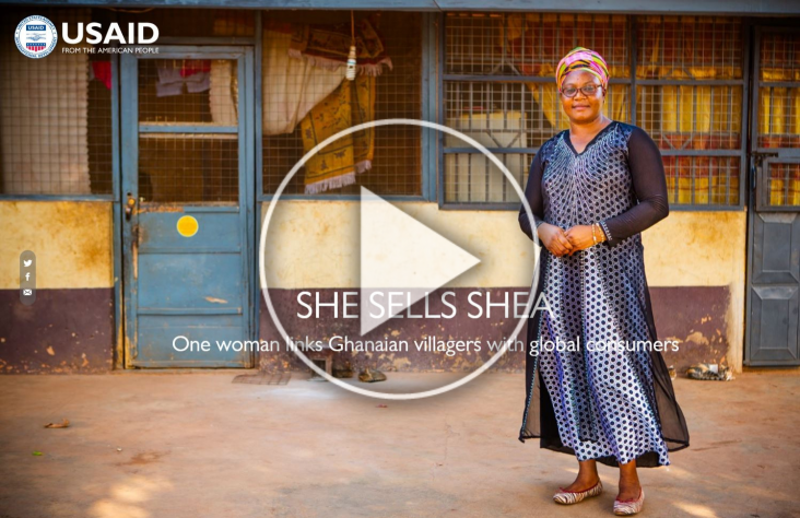 Thumbnail of a video showing a woman standing in front of a store