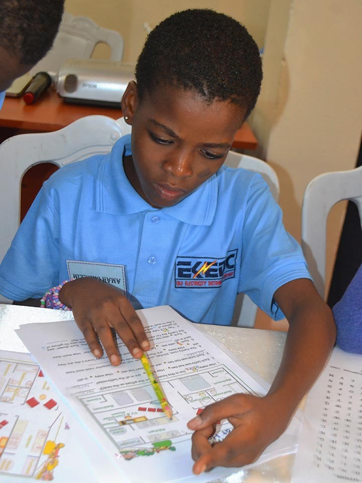 The participants, like this girl, got many opportunities to learn about electricity during their visit.