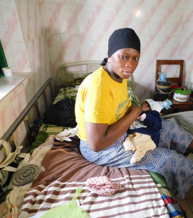 A mother breastfeeding her new baby at the Mamou Regional Hospital.