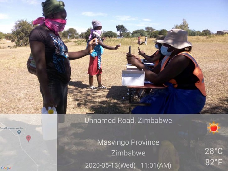 A food distribution table on an unnamed Road in Zimbabwe, Masvingo Province, Zimbabwe