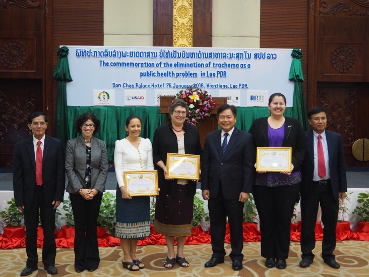 U.S. Ambassador Rena Bitter (Second from left) and Minister of Health Dr. Bounkong Sihavong (fifth from left) celebrate Elimination of Trachoma along with officials from Laos and the international community.