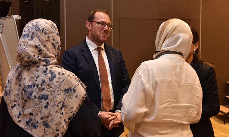 The Libya External Office Chargé d’Affaires a.i. Josh Harris speaks with participants at the Libya Women's Economic Empowerment Conference 