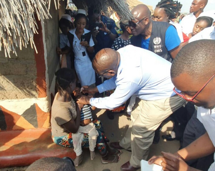 Zambia's Minister of Health administers an oral polio vaccine in 2019