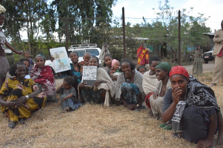 A women’s care group gathers to discuss health and nutrition practices. 