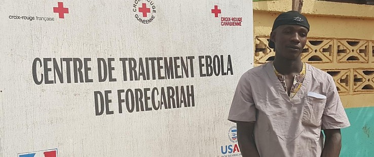 Alseny Touré works at the French Red Cross site near the Ebola Treatment Unit in Forécariah, Guinea.