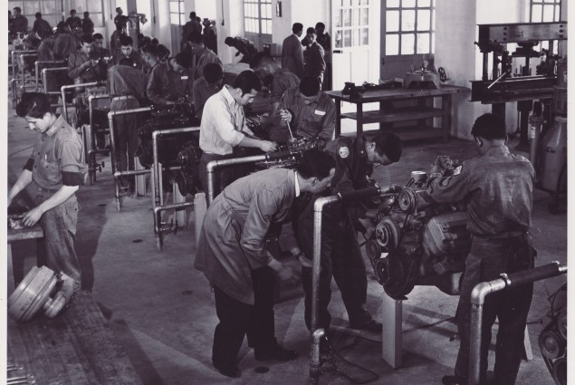 Students Repairing Car