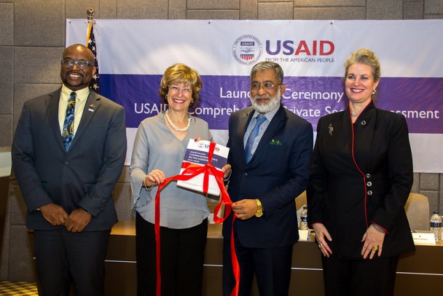 USAID Deputy Administrator Bonnie Glick (second from left) and Executive Chairman of Bangladesh Investment Development Authority (BIDA) Sirazul Islam launch USAID’s Comprehensive Private Sector Assessment with USAID/Bangladesh Mission Director Derrick S. Brown and U.S. Embassy Deputy Chief of Mission JoAnne Wagner.