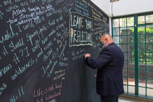 While visiting the August 7 Memorial Garden, USAID Acting Administrator Barsa and U.S. Ambassador McCarter pay their respects to the lives lost. 