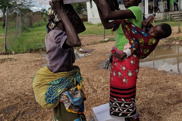 Helping hand after receiving first kits 