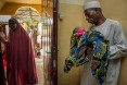 A father holds his new born child in Nigeria