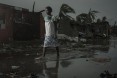 Praia Nova Village was one of the most affected neighborhoods in Beira. Being a located on the coast, this town of loosely built homes were extremely vulnerable to the high winds and rain. Following the cyclone families are returning trying to pick up the pieces of their lives.  Photo by  Josh Estey/CARE