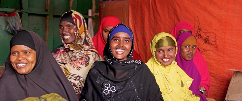 a group of women smiling