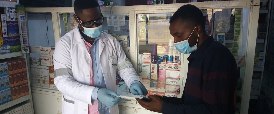 A healthcare worker shares a chart with a patient