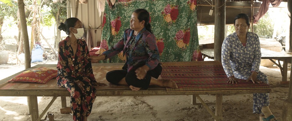 A health worker tends to TB patients