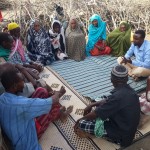 Muna and others in her community receive vouchers to buy food to stave off hunger, as well as seeds to plant in order to produce their own food. 