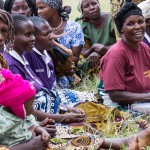 Women gather at a USAID-supported village savings and lending group.