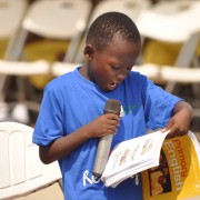 A child reads to the audience during Ghana’s reading festival in Cape Coast.