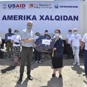 U.S. Ambassador handing over supplies to Sog’lom Avlod Uchun for families affected by Sardoba Dam Breach