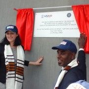 USAID Representative Sophia Brewer and the mayor of Hawassa uncover a plaque for the new Finchawa Health Center.