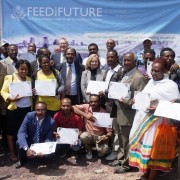 USAID Mission Director Leslie Reed and Minister of Livestock and Fisheries Fekadu Beyene with USAID grantees and CNFA’s Marc Steen