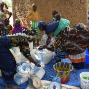 Women prepare ready-to-use therapeutic food