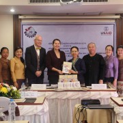 USAID Laos Country Director Alexandria Huerta presented handbooks on the use of natural dyes on handicraft production to the Ministry of Industry and Commerce