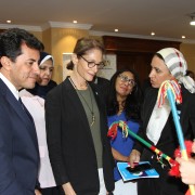 Mission Director Sherry F. Carlin and Minister of Youth and Sports Dr Ashraf Sobhy meet a young women that participates in the Meshwary project.