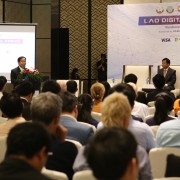 U.S. Ambassador Rena Bitter (seated on stage, first from the right) and Lao Officials open the first-ever Lao Digital Forum in Vientiane on January 26, 2018.