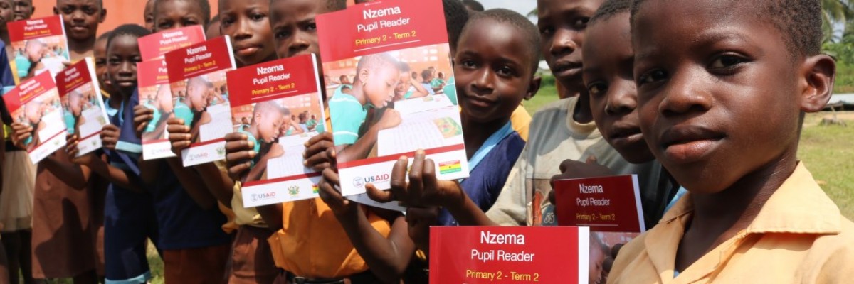 P2 Pupils of Sowodadzen Primary School in the Jomoro District of the Western Region displaying the materials the school received.